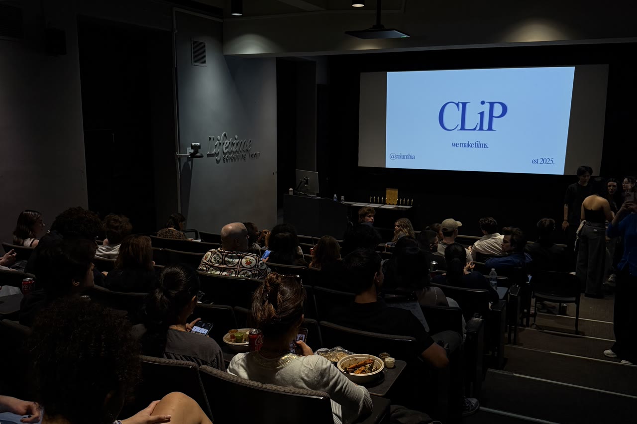 An audience watching the CLiP title card at the Final Cut Premiere screening.