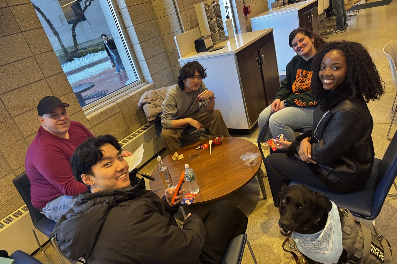 CLiP members meeting around a table at Next Frame Focus.